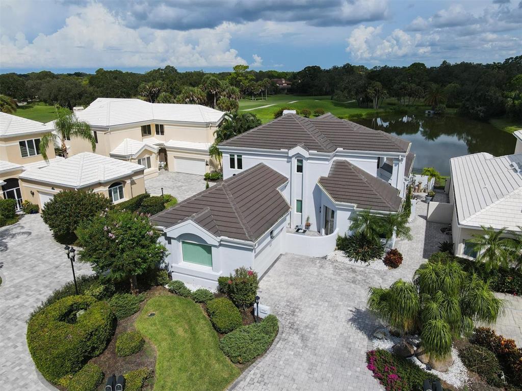 7716 Club Lane Sarasota, FL 34238 - Photo 10 of 68 an aerial view of a house