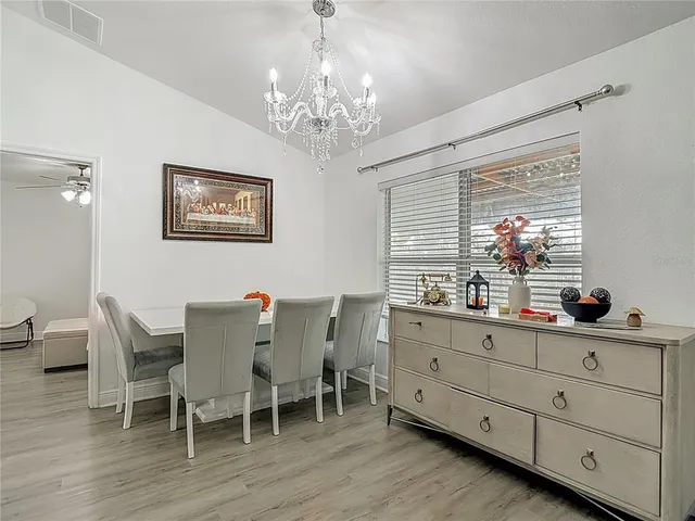 a kitchen that has a sink cabinets counter space and stainless steel appliances