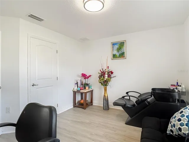 a bathroom with double vanity sinks and a mirror