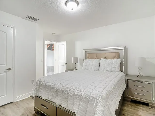 a bathroom with a shower a toilet and a shower