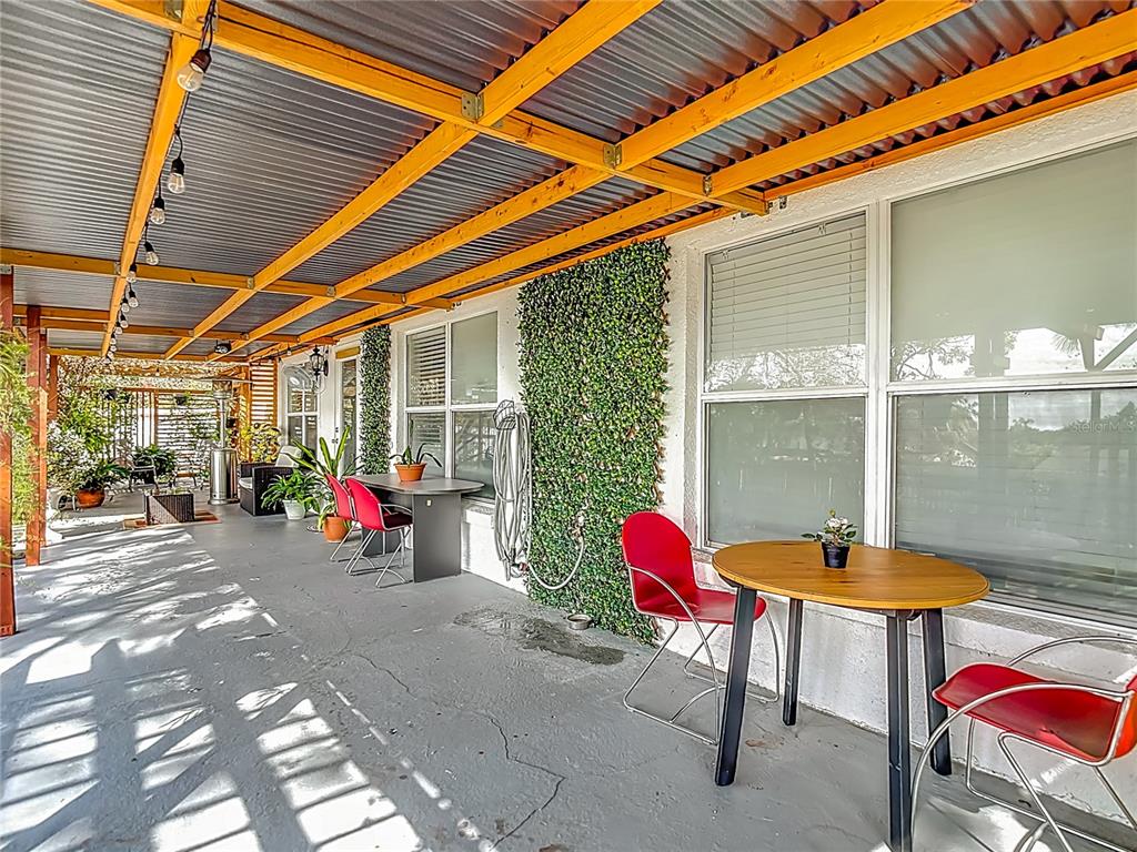 13108 Oneida Street Spring Hill, FL 34609 - Photo 51 of 62 a view of a outdoor space with seating area