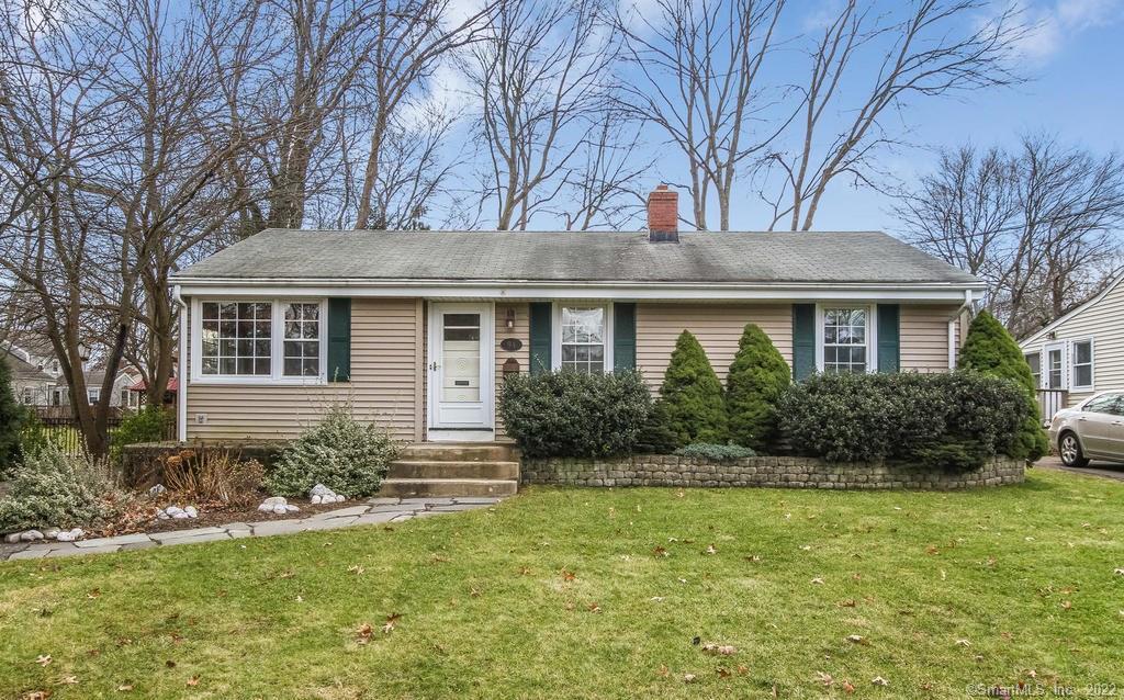 94 Bunce Road Wethersfield, CT 06109 - Photo 1 of 1 a front view of a house with a yard