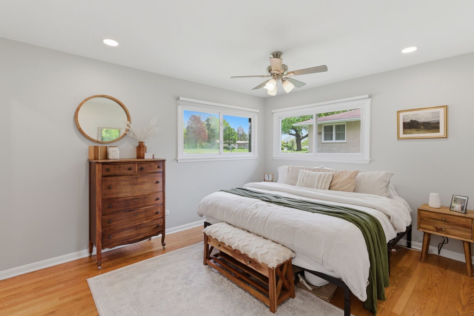 11N980 Almora Terrace Elgin, IL 60124 - Photo 12 of 29 a bed room with a bed and a dresser