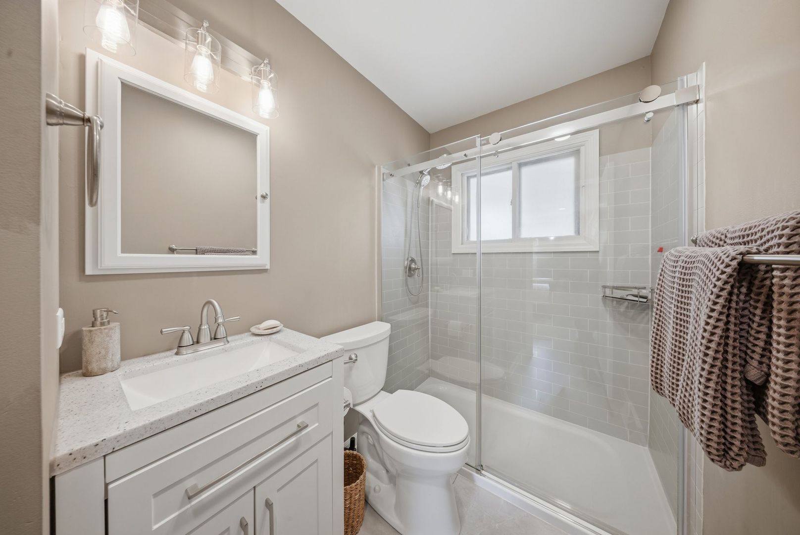11N980 Almora Terrace Elgin, IL 60124 - Photo 14 of 29 a bathroom with a sink toilet and shower