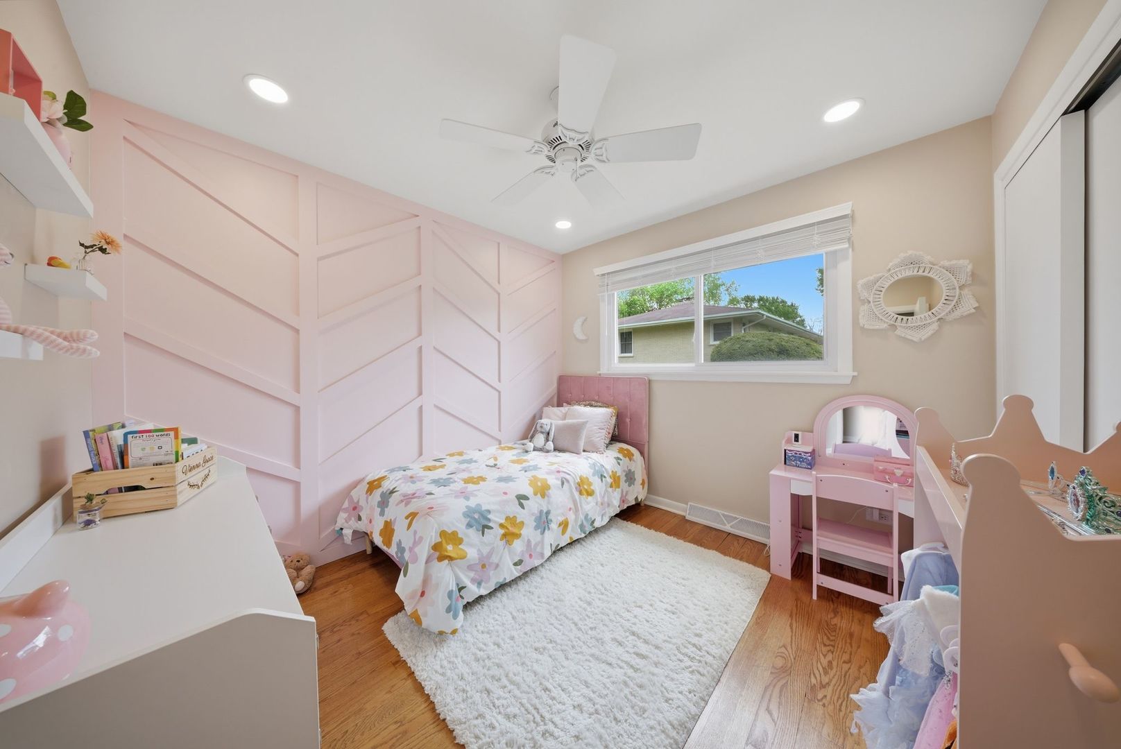 11N980 Almora Terrace Elgin, IL 60124 - Photo 15 of 29 a bedroom with a bed and a chandelier