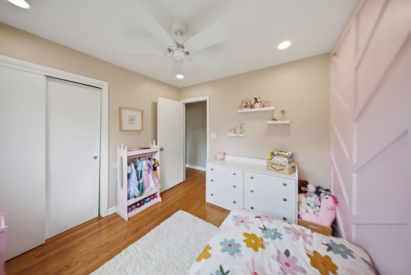 11N980 Almora Terrace Elgin, IL 60124 - Photo 16 of 29 a bedroom with baby bed toys and wooden floor