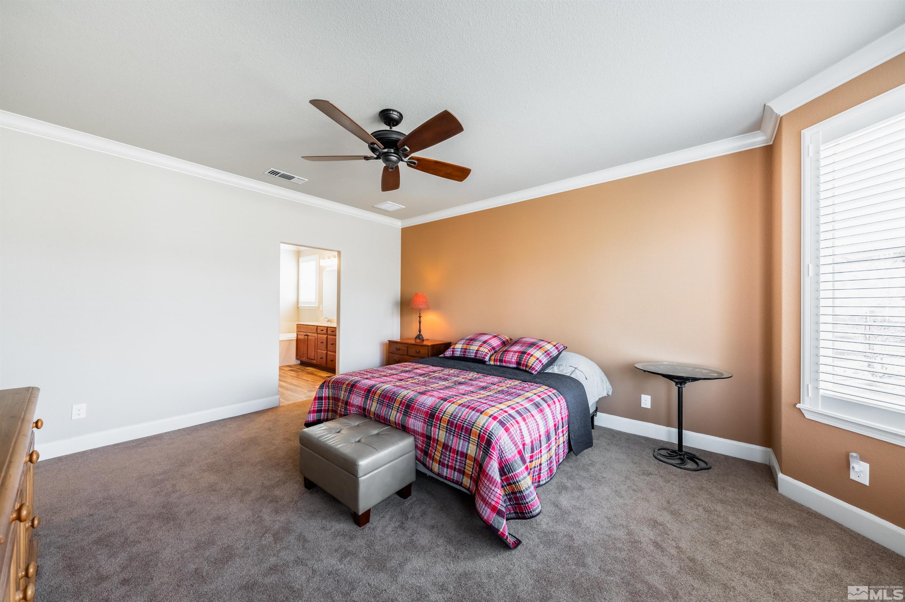 990 Broderick Trail Reno, NV 89523 - Photo 25 of 38 a bedroom with a bed and a window