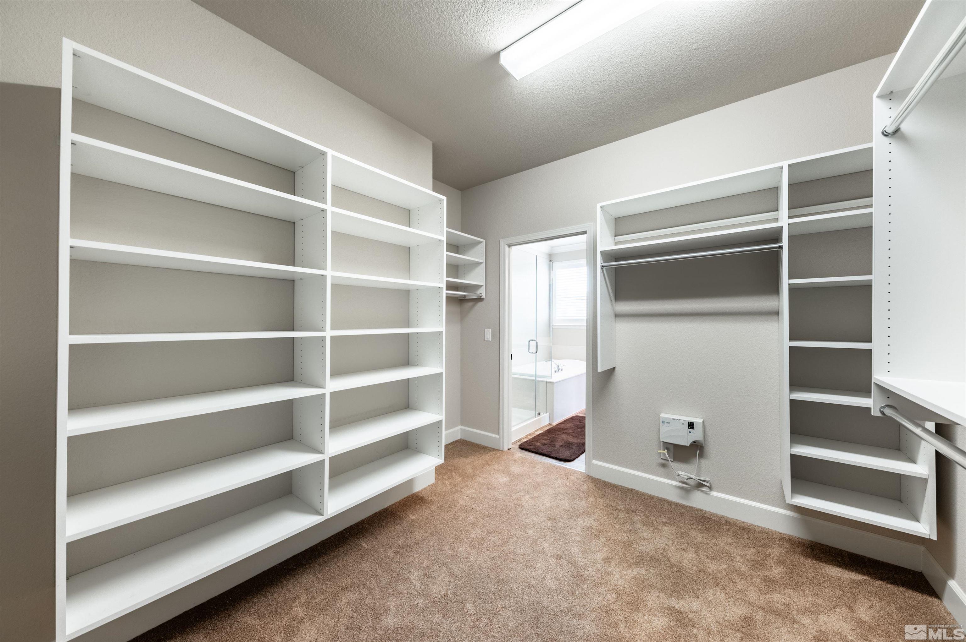 990 Broderick Trail Reno, NV 89523 - Photo 30 of 38 a view of an empty room with empty shelves