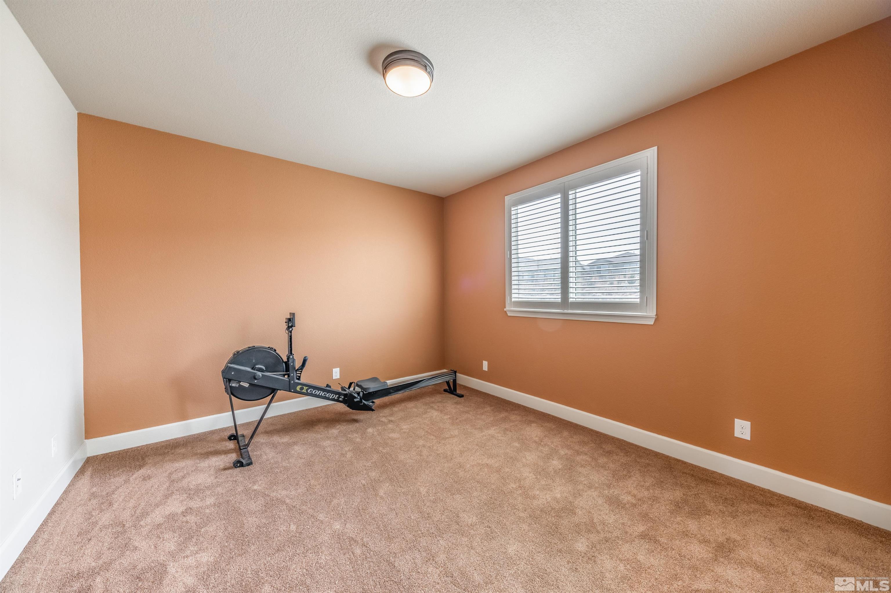 990 Broderick Trail Reno, NV 89523 - Photo 31 of 38 a room with furniture and a window