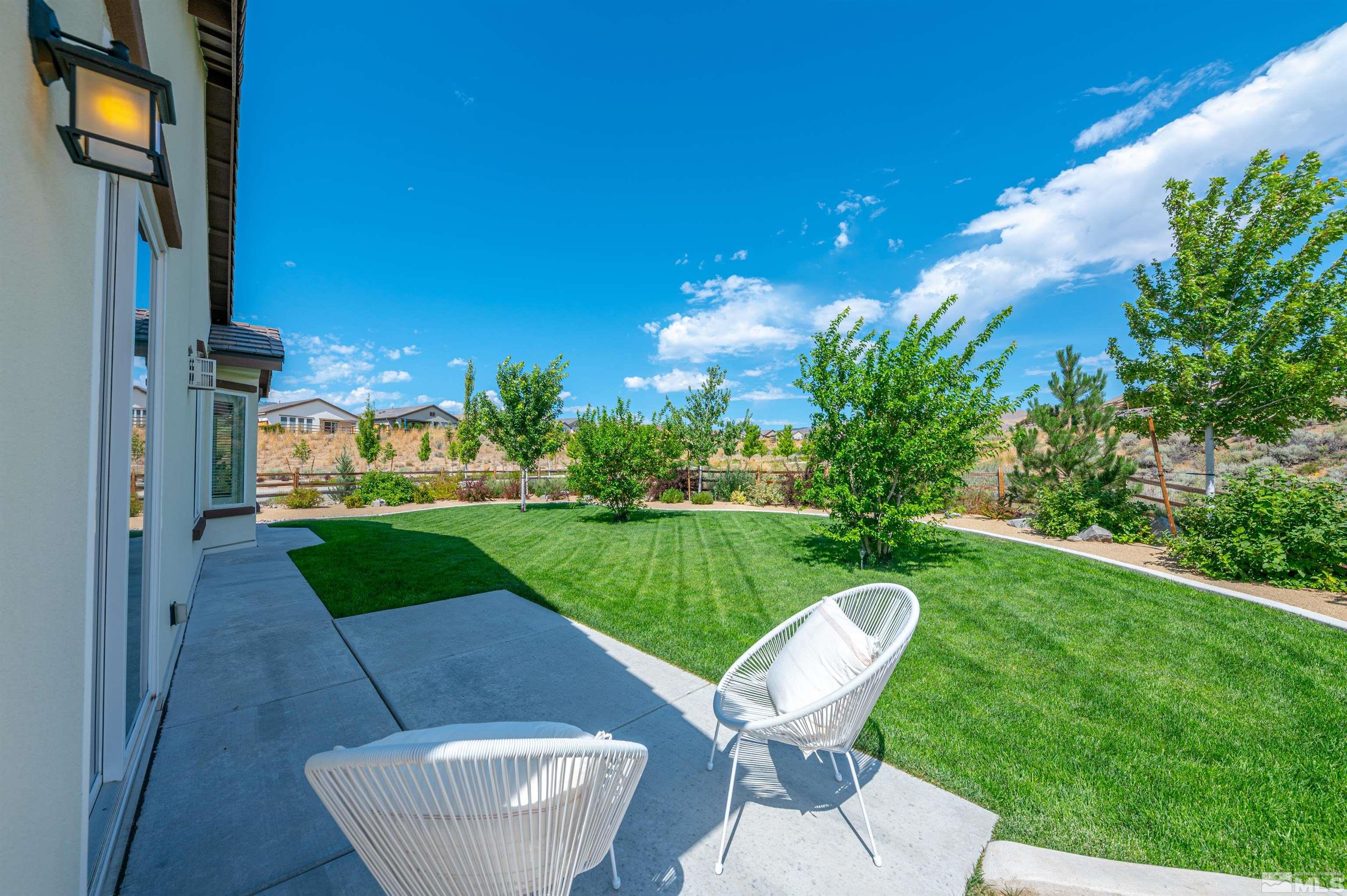 990 Broderick Trail Reno, NV 89523 - Photo 34 of 38 a view of a chair and table in the back yard