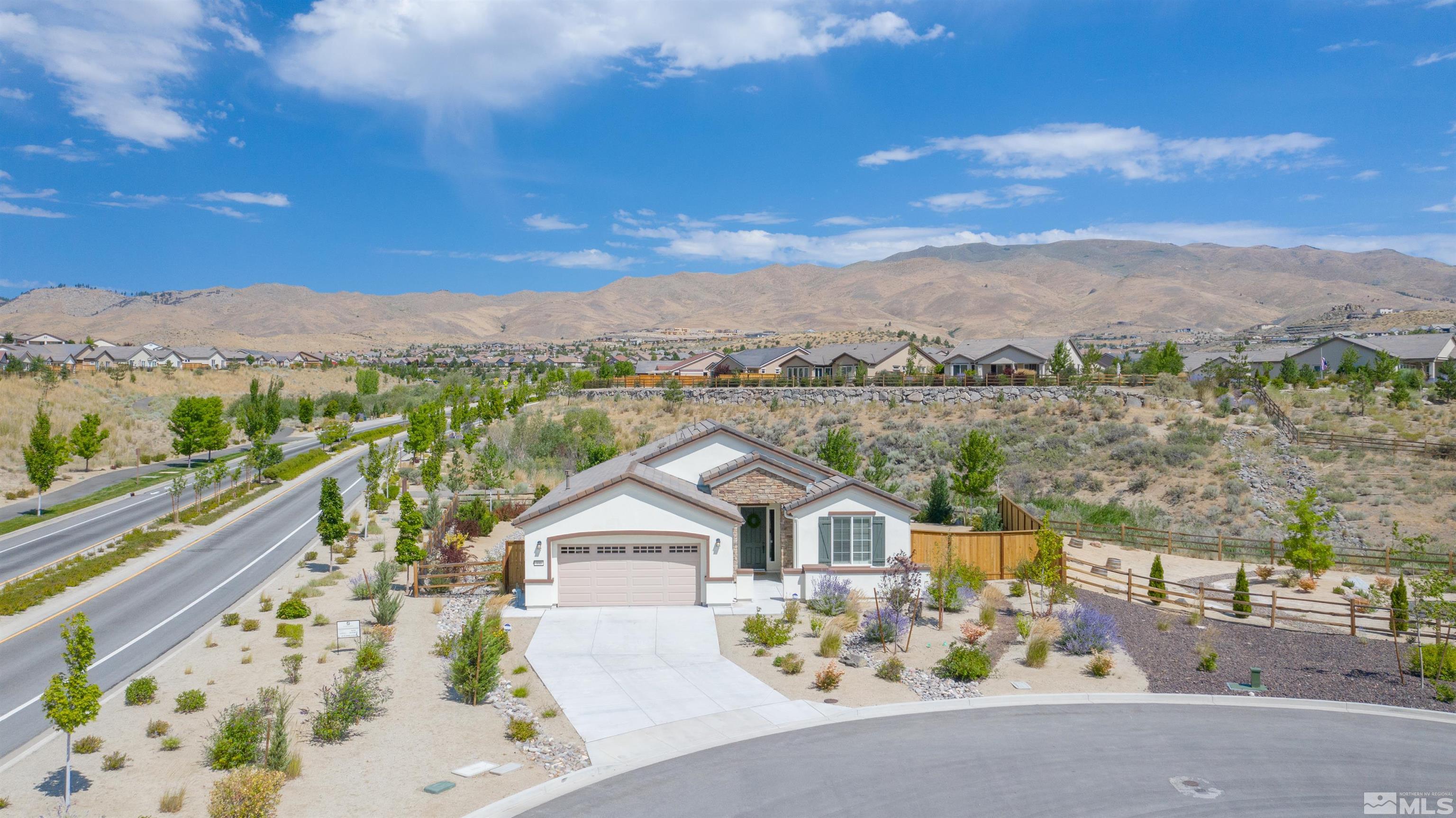 990 Broderick Trail Reno, NV 89523 - Photo 4 of 38 a view of a houses with a balcony