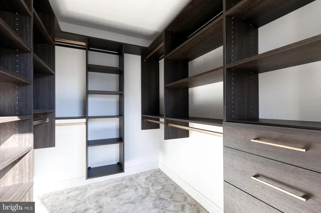 a view of a balcony with furniture