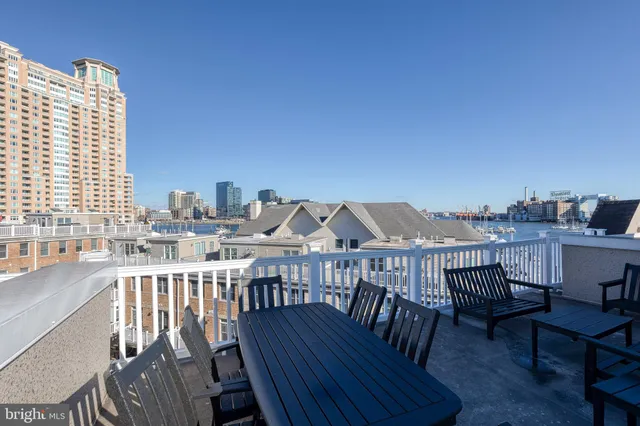 a car parked in front of a brick building