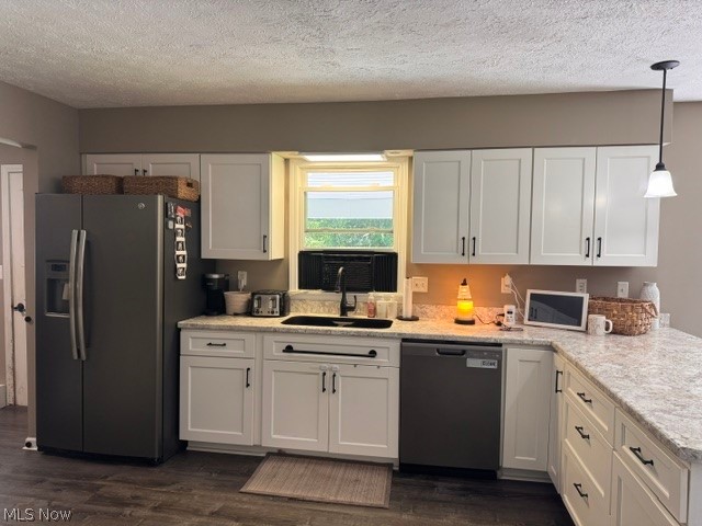 2760 Haines Road Madison, OH 44057 - Photo 13 of 33 Modern kitchen featuring white shaker cabinetry with dark hardware