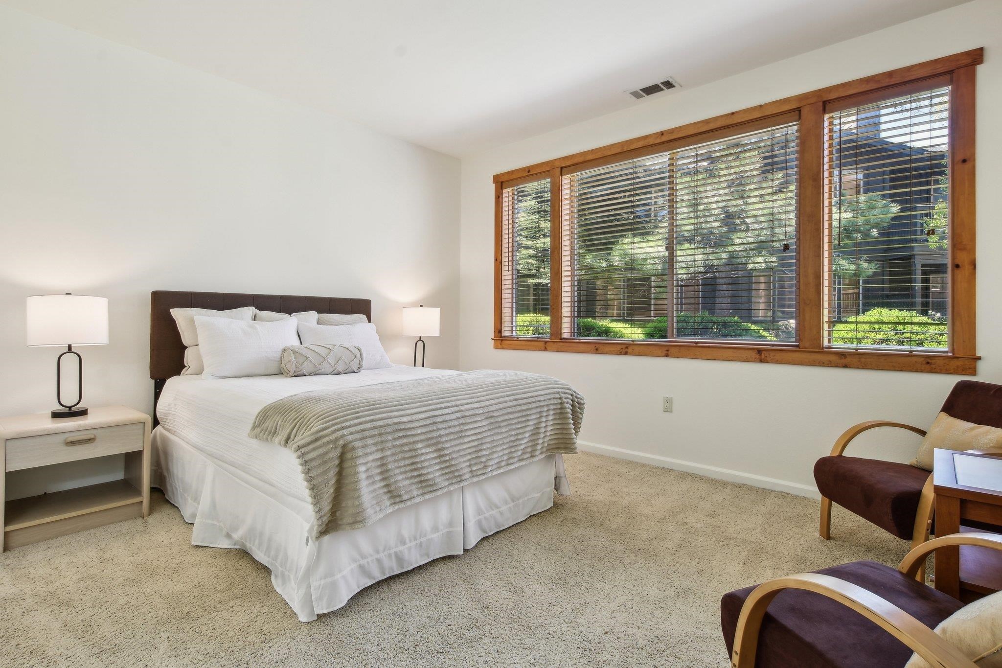 10844 Cinnabar Way, Unit 3 Truckee, CA 96161 - Photo 10 of 28 a bedroom with a bed couch and window