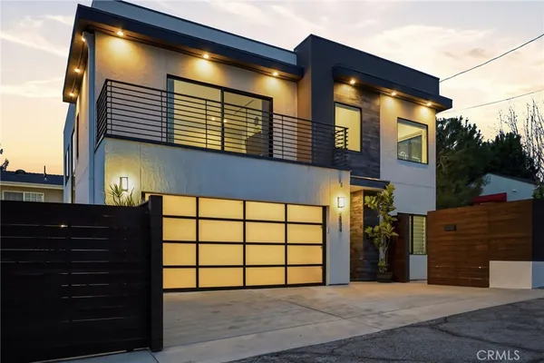 a view of a house with a garage