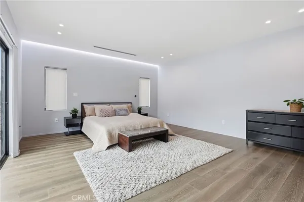a view of a balcony with wooden floor