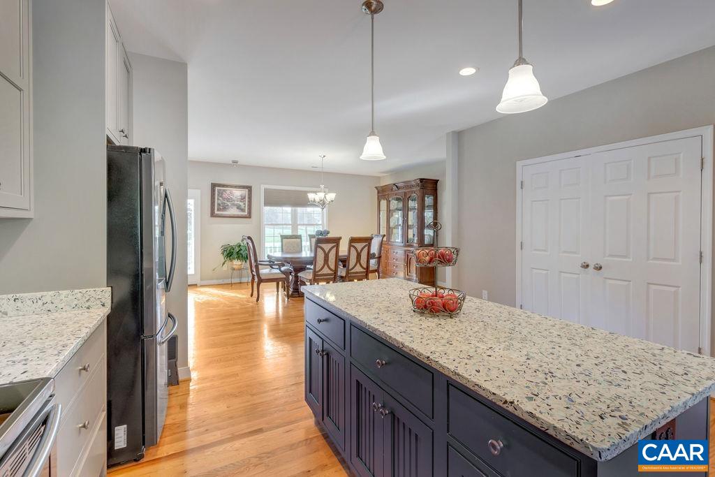 1275 Poplar Spring Road Scottsville, VA 24590 - Photo 5 of 51 a kitchen with counter top space and wooden floor