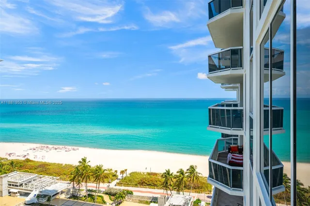 a view of a balcony with ocean view