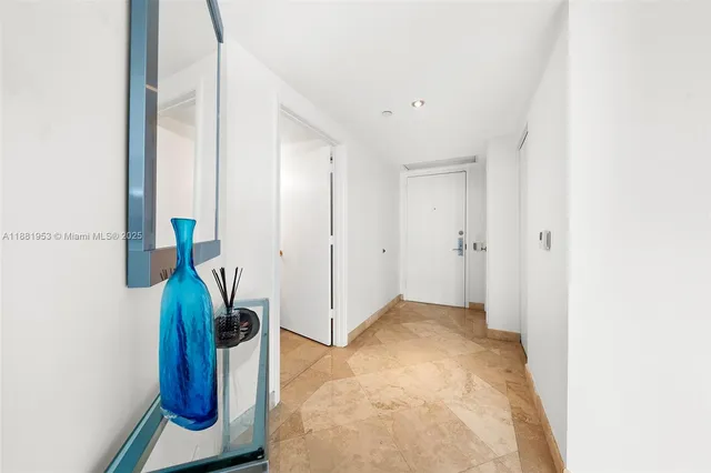 a spacious bathroom with a granite countertop sink a toilet and shower