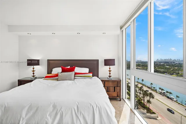 a view of a living room and a floor to ceiling window