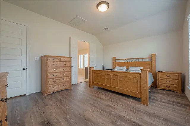 wooden room with furniture and wooden floor