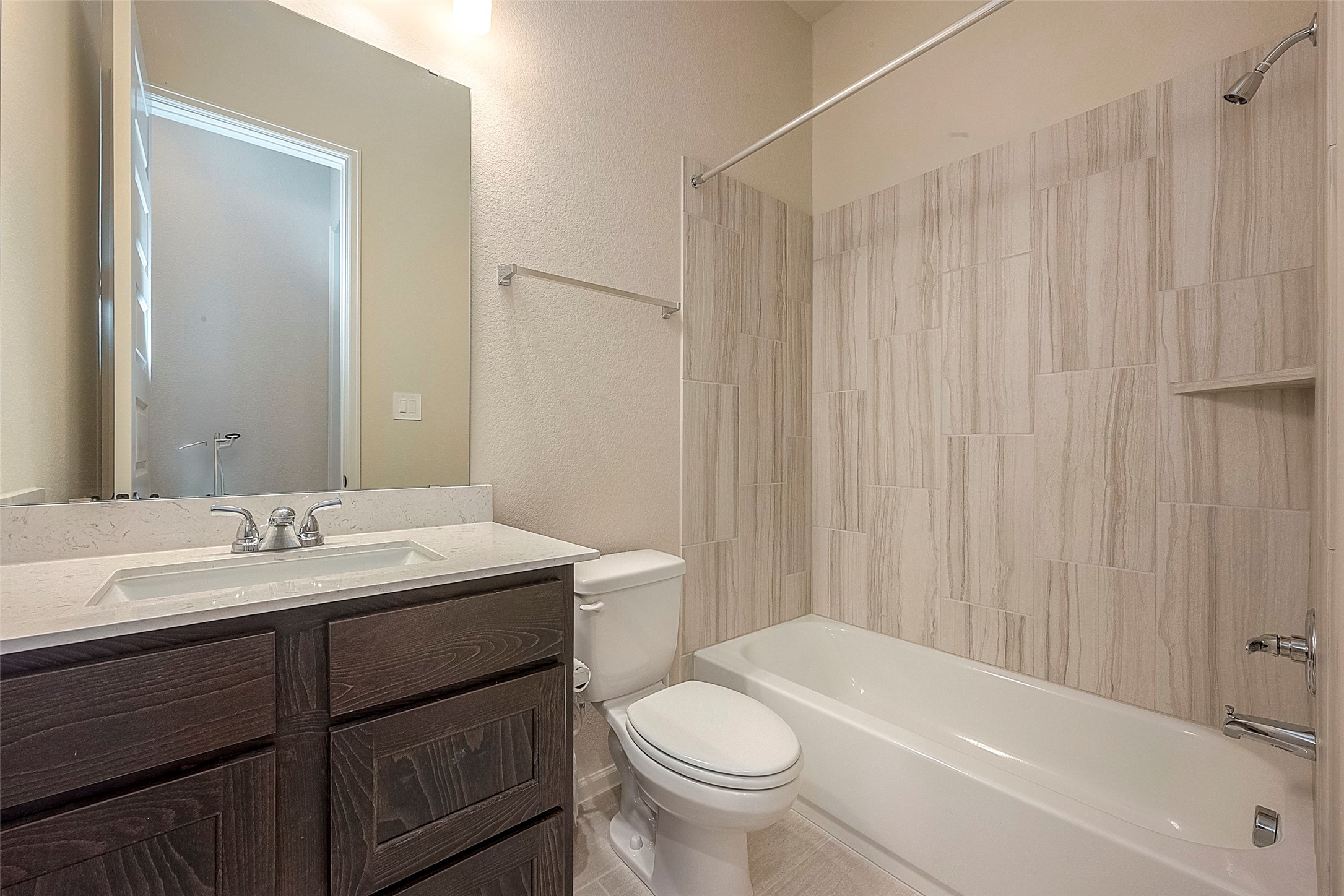 4602 Ana Ridge Lane Fulshear, TX 77441 - Photo 29 of 42 a bathroom with a sink a toilet and shower