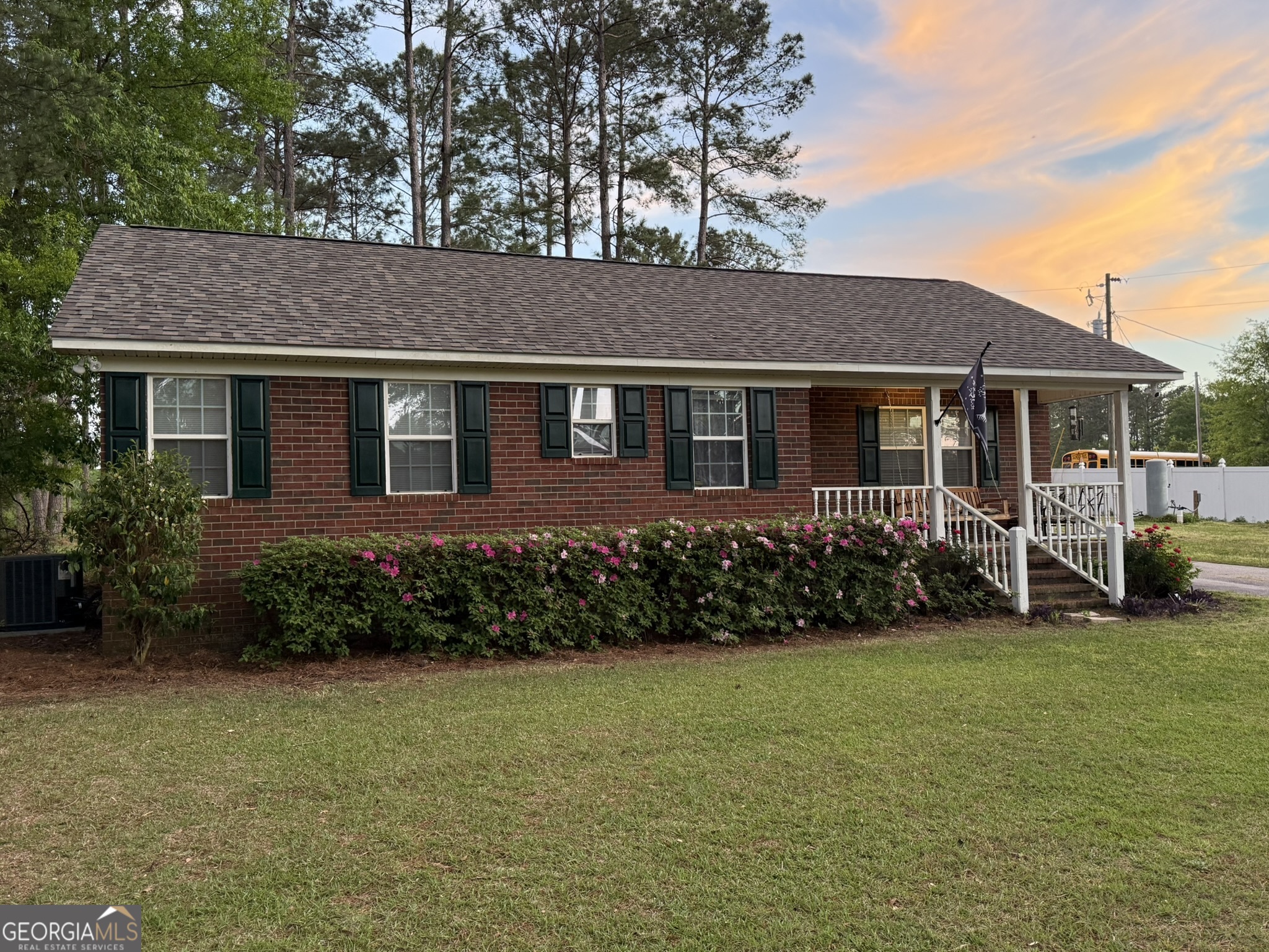 26844 Highway 46 Metter, GA 30439 - Photo 2 of 36 a front view of a house with garden