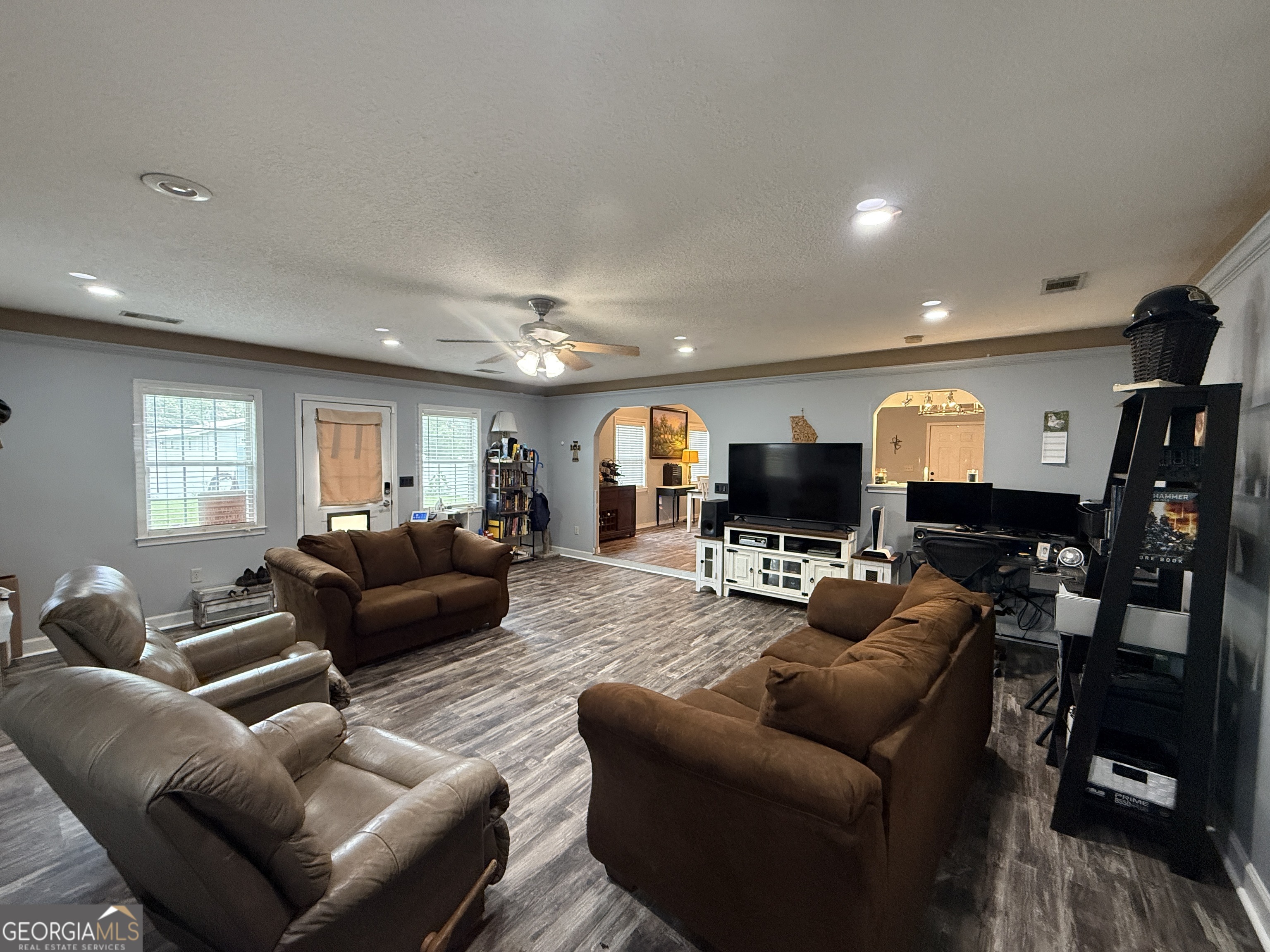 26844 Highway 46 Metter, GA 30439 - Photo 21 of 36 a living room with furniture kitchen view and a flat screen tv
