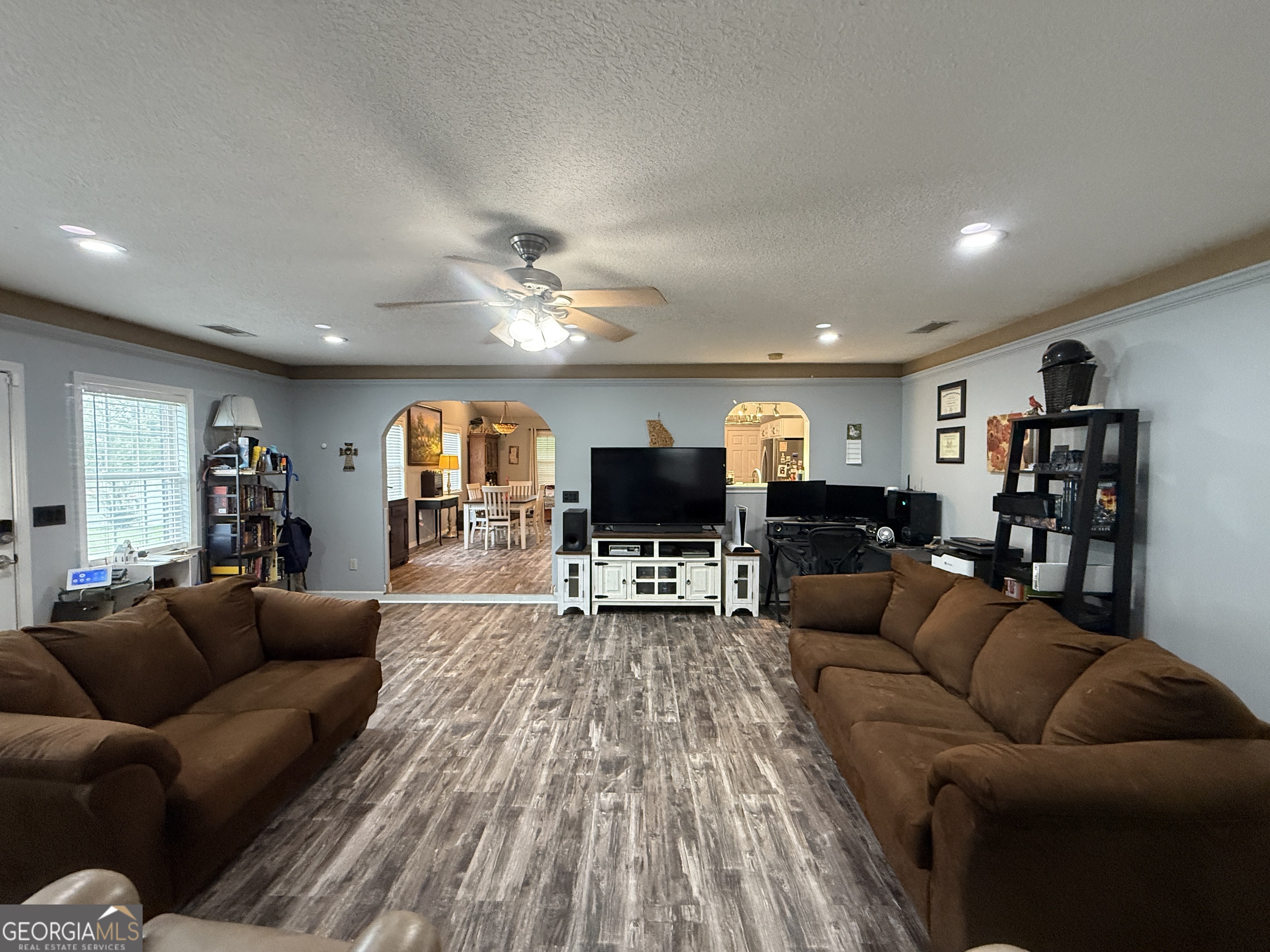 26844 Highway 46 Metter, GA 30439 - Photo 22 of 36 a living room with furniture and wooden floor