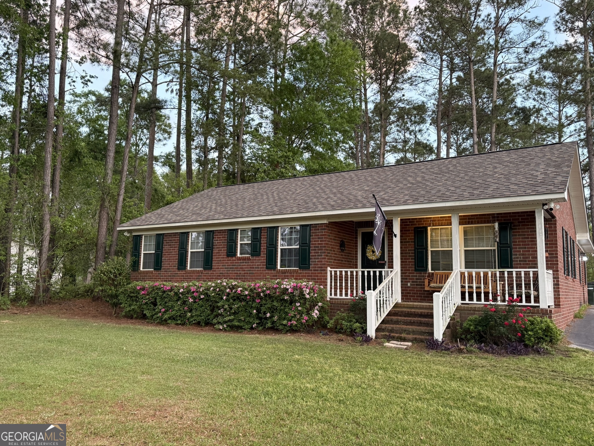 26844 Highway 46 Metter, GA 30439 - Photo 3 of 36 a view of a house with a yard and deck