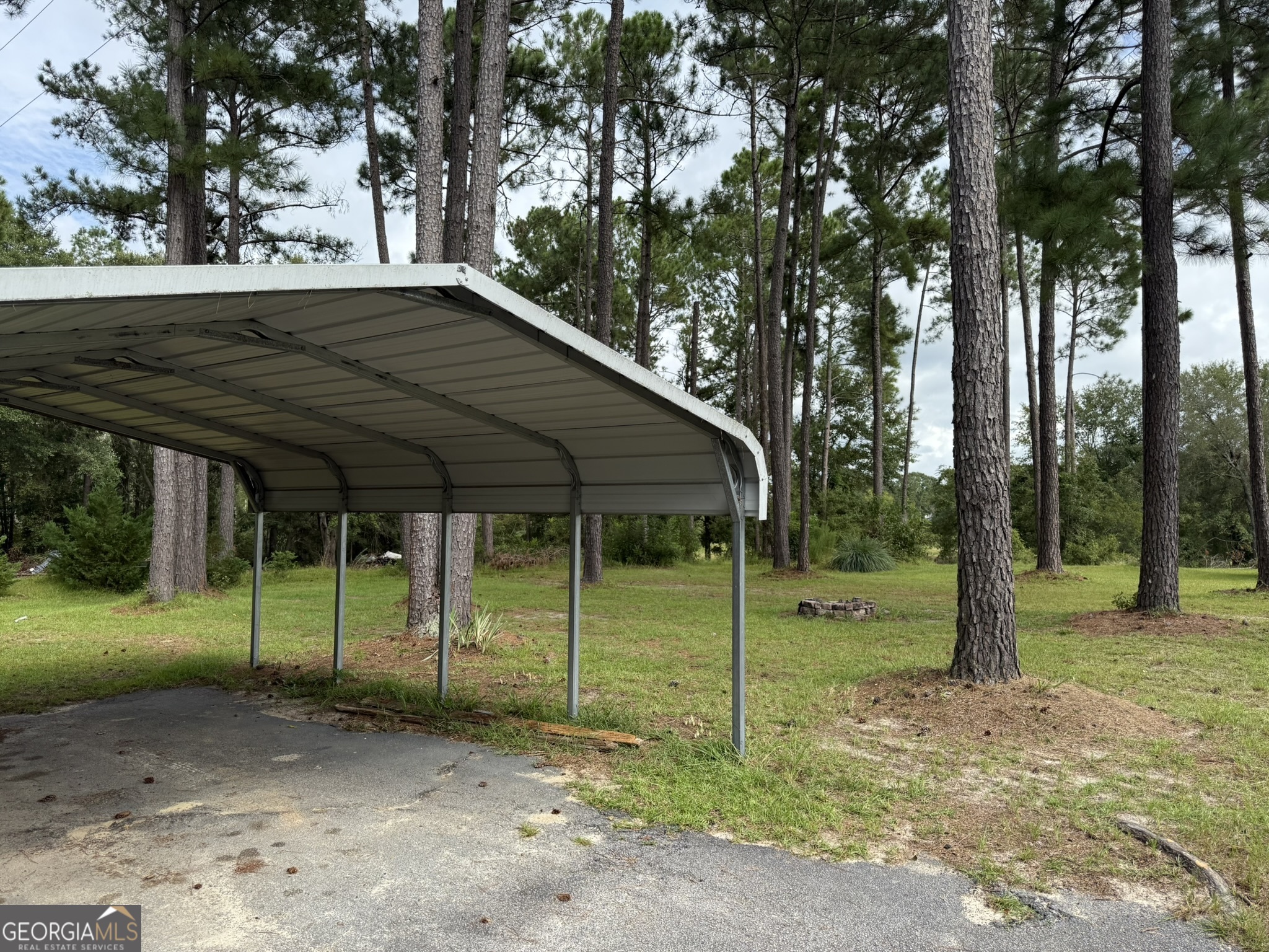26844 Highway 46 Metter, GA 30439 - Photo 34 of 36 a backyard of a house with barbeque oven