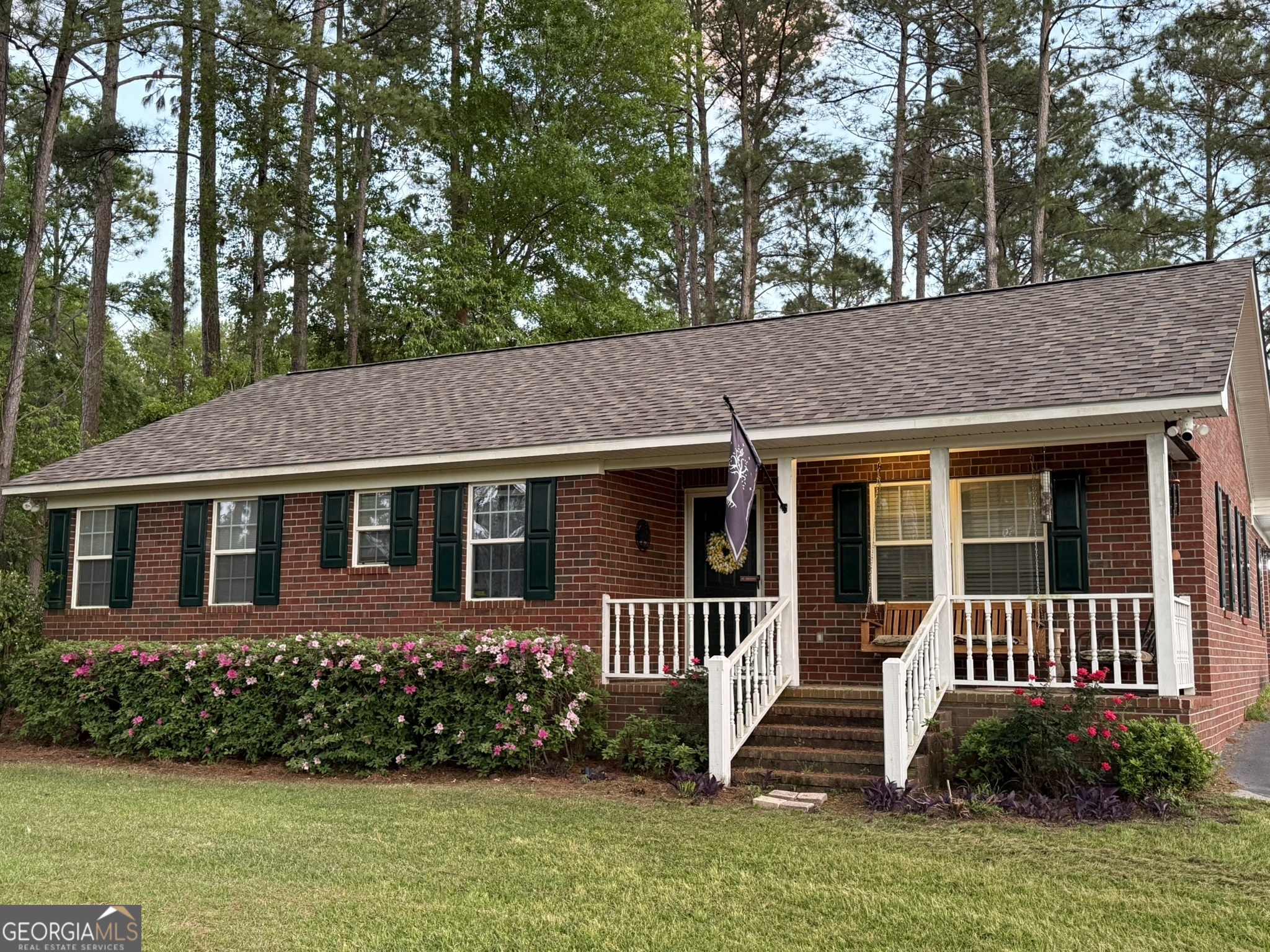 26844 Highway 46 Metter, GA 30439 - Photo 4 of 36 front view of a house with a yard