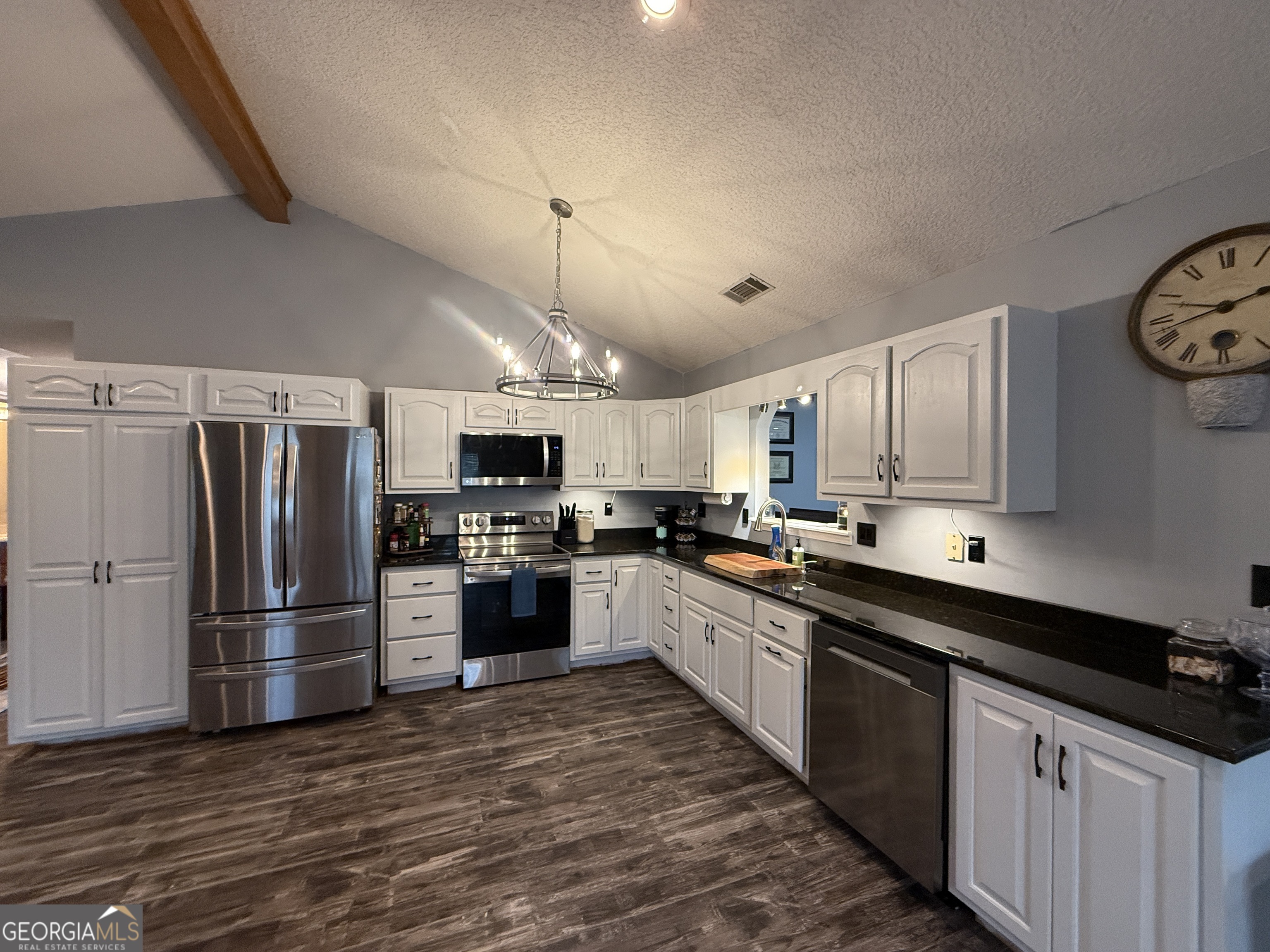 26844 Highway 46 Metter, GA 30439 - Photo 6 of 36 a kitchen with stainless steel appliances granite countertop a refrigerator a sink dishwasher a stove and a refrigerator