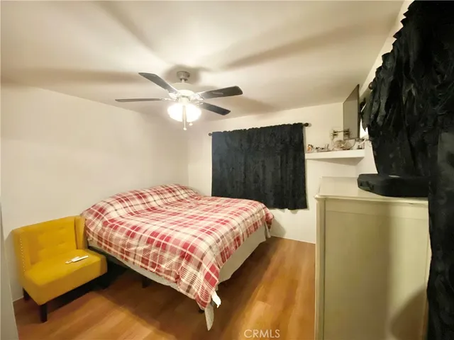 a bedroom with a bed and a walk in closet