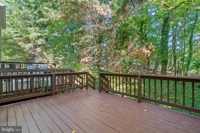 a view of balcony with wooden floor