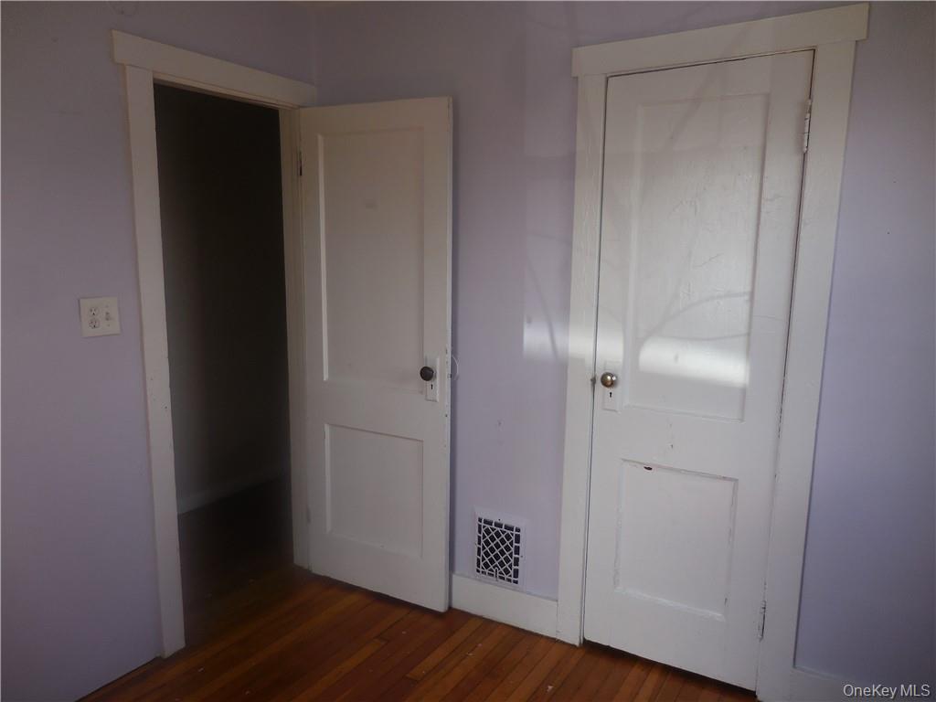 10 Edmunds Lane, Unit A Pine Bush, NY 12566 - Photo 14 of 23 a view of empty room with wooden floor