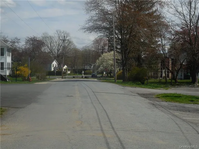 a view of road and trees