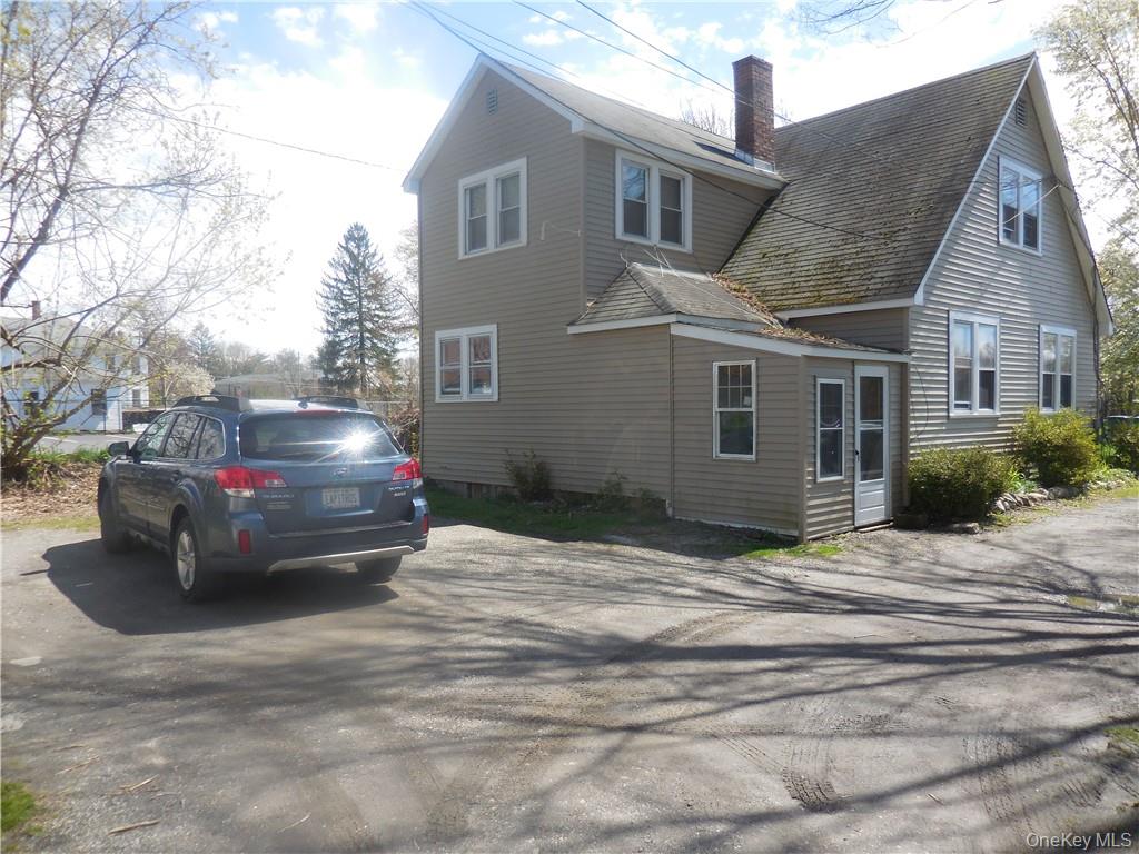 10 Edmunds Lane, Unit A Pine Bush, NY 12566 - Photo 3 of 23 a car parked in front of a house