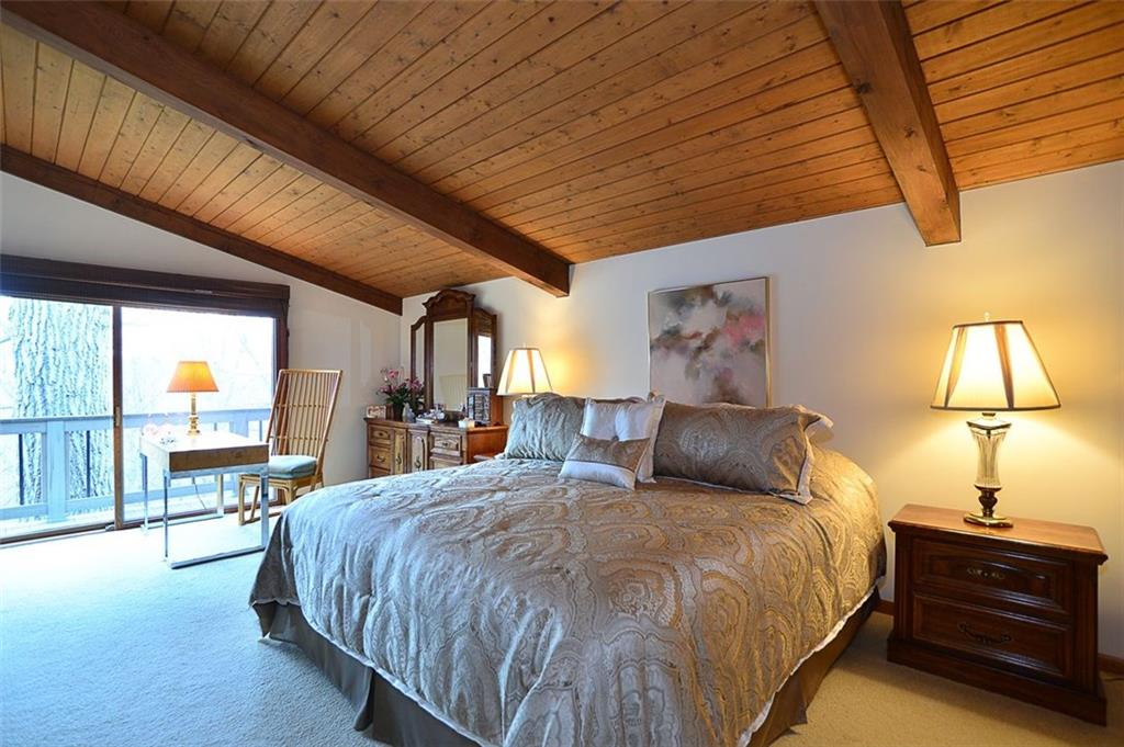 32 Club Road Carnegie, PA 15106 - Photo 15 of 24 Master suite that opens to balcony, has a reading nook overlooking first floor, abundant closet space and a full bath.