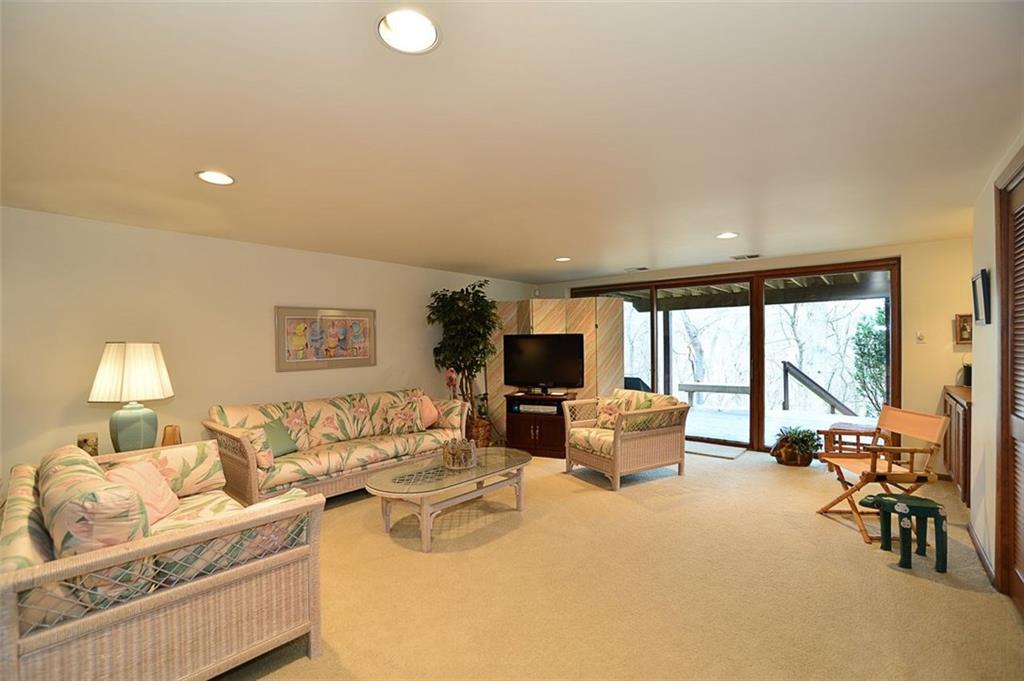 32 Club Road Carnegie, PA 15106 - Photo 18 of 24 Lower level game room open onto the rear deck