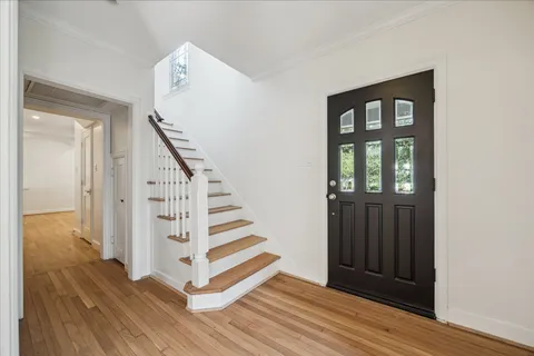 a view of entryway with wooden floor