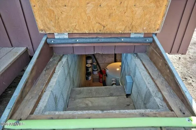 a view of stairs and with wooden floor