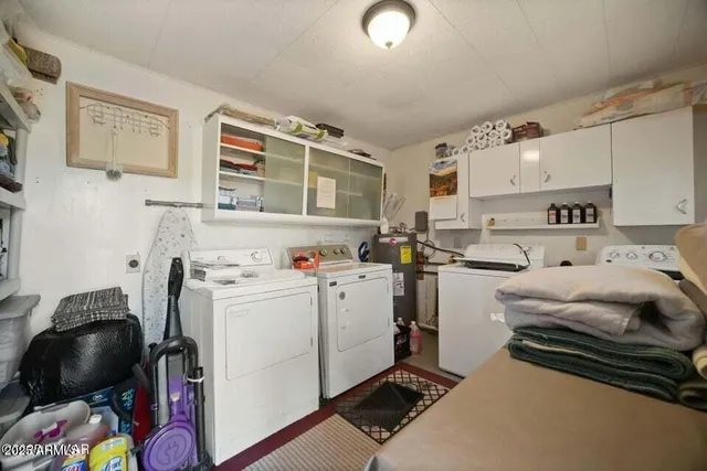 a storage room with washer and dryer