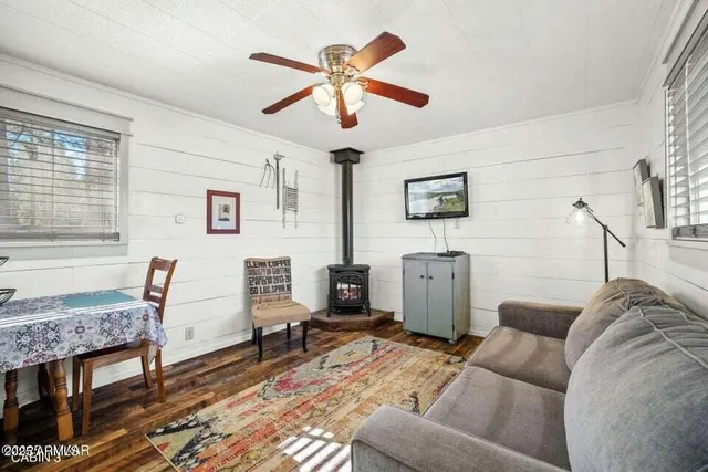 a living room with furniture and a window