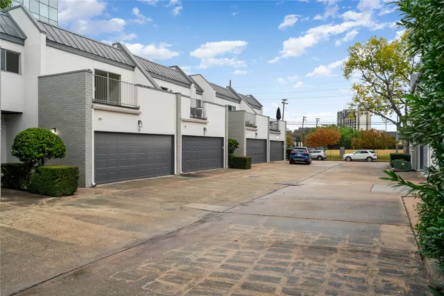 a view of a street with cars