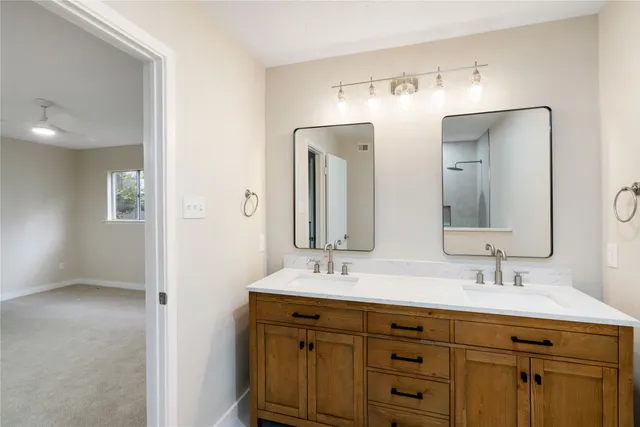 a white toilet sitting next to a bath tub