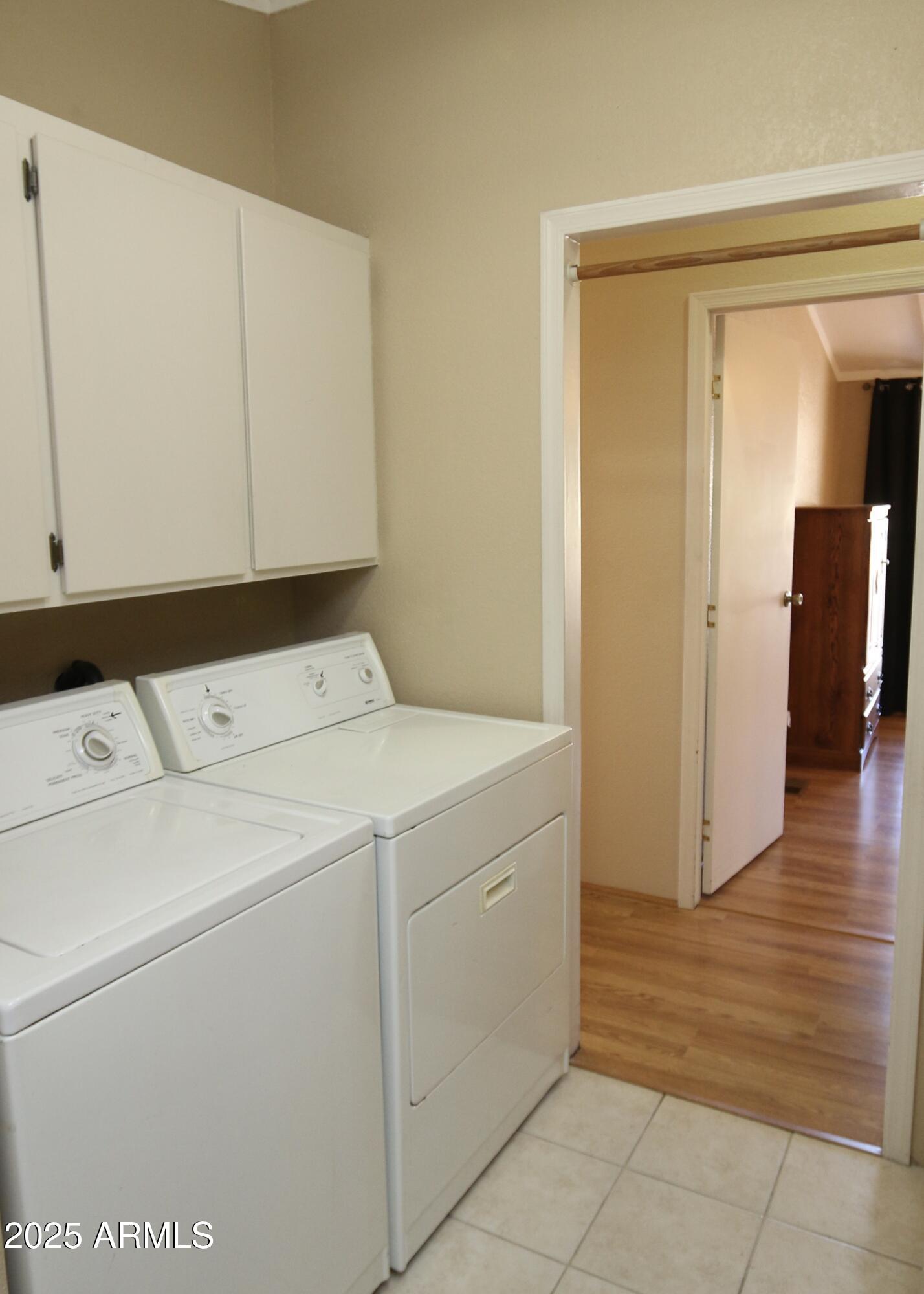 2701 East Utopia Road, Unit 208 Phoenix, AZ 85050 - Photo 11 of 22 a utility room with dryer and washer