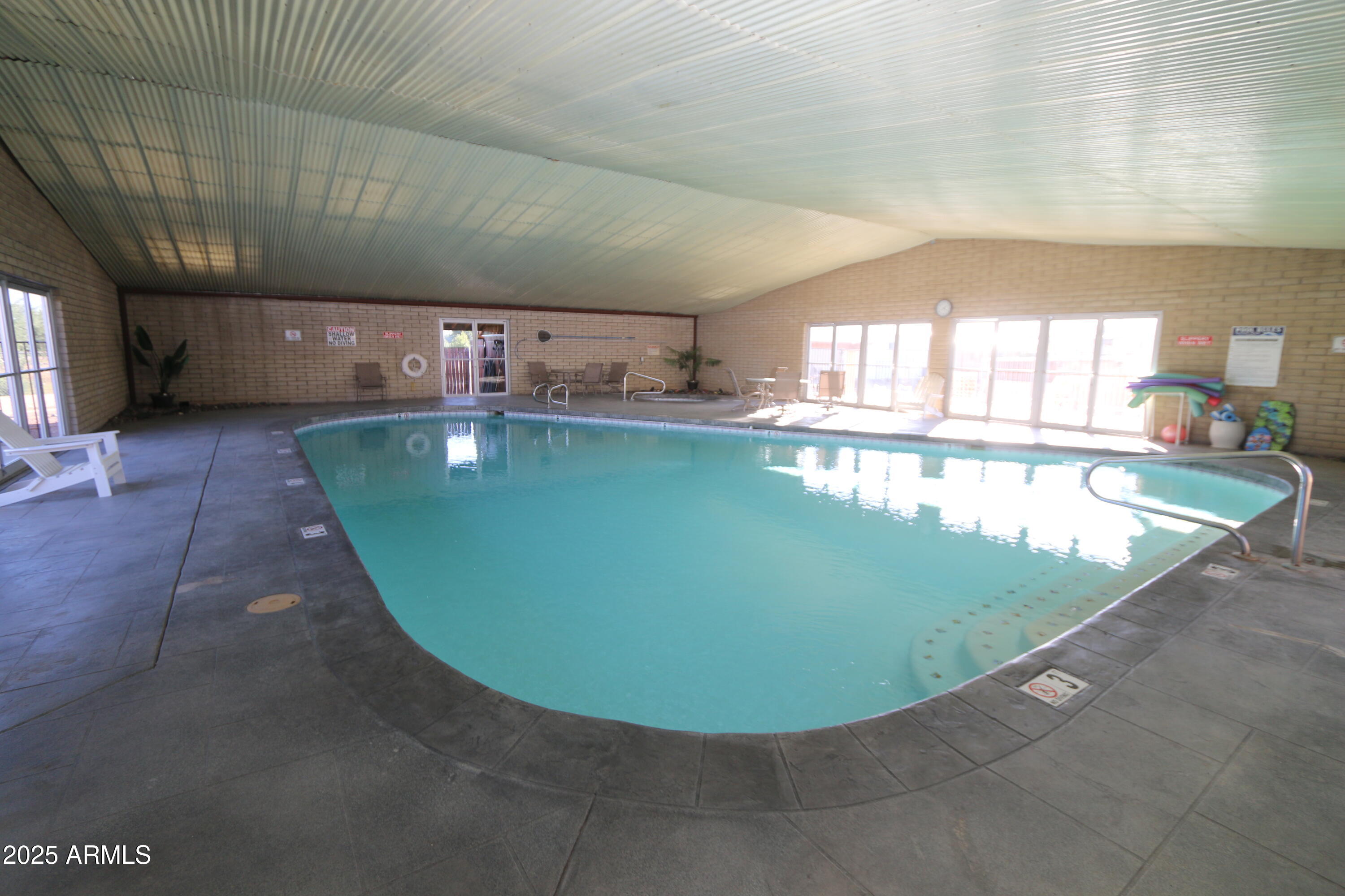 2701 East Utopia Road, Unit 208 Phoenix, AZ 85050 - Photo 22 of 22 a view of a swimming pool