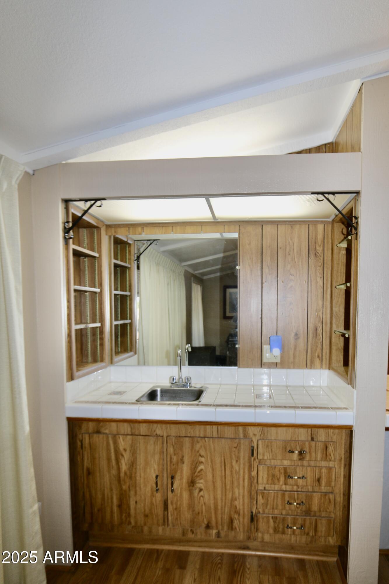 2701 East Utopia Road, Unit 208 Phoenix, AZ 85050 - Photo 9 of 22 a view of front door and bedroom